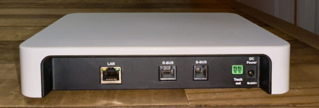 The back side of the z21 (white) with the LAN socket, R-bus and B-bus connectors.